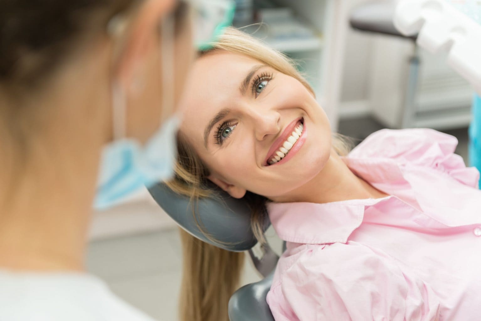 woman smiling at doctor 1534x1024